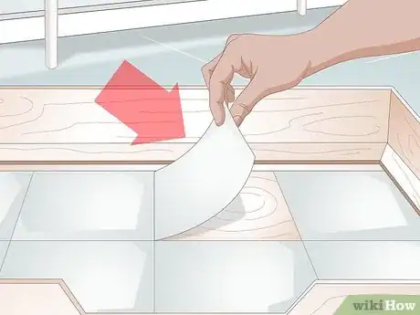 Imagen titulada Keep a Whelping Box Clean Step 1