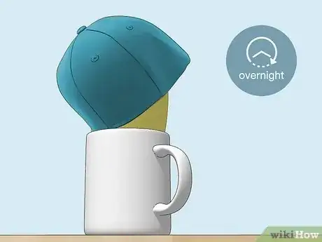 Imagen titulada Break in a Baseball Cap Step 8