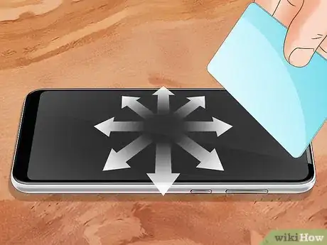 Imagen titulada Get Air Bubbles Out of a Glass Screen Protector Step 5