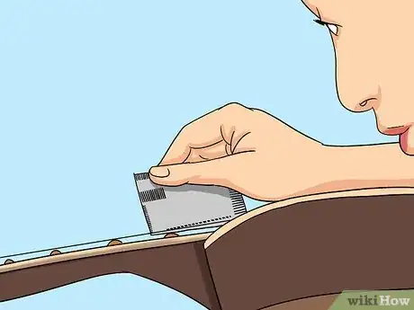 Imagen titulada Adjust Acoustic Guitar Intonation Step 14