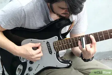 Imagen titulada Use a Guitar Slide Step 10