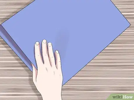 Imagen titulada Pass Your Body Through a Sheet of Paper Step 7
