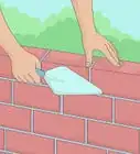 colocar ladrillos