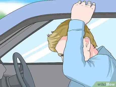 Imagen titulada Get out of a Car Without Getting Shocked by Static Electricity Step 1