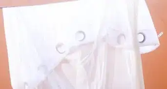 lavar los visillos (cortinas finas)