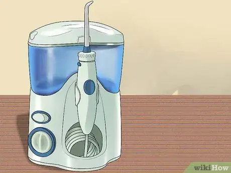 Imagen titulada Floss With Braces Step 10