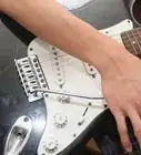 cuidar una guitarra