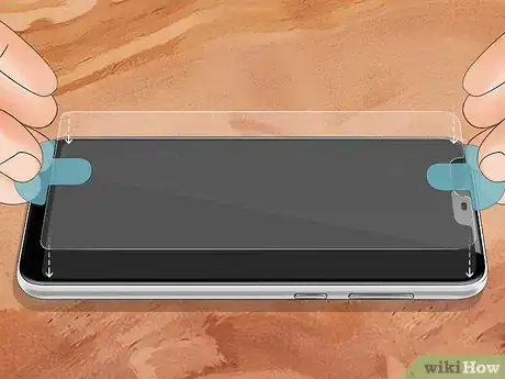 Imagen titulada Get Air Bubbles Out of a Glass Screen Protector Step 4