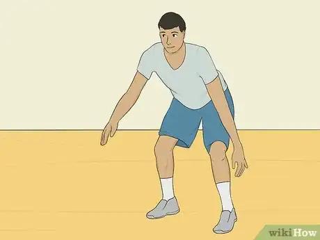 Imagen titulada Dribble a Basketball Between the Legs Step 1.jpeg