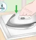 eliminar manchas de aceite del papel