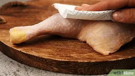Imagen titulada Cut Chicken Thighs Step 1