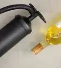 abrir una botella sin un destapador