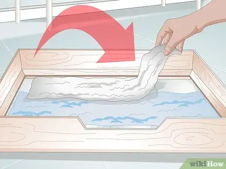 Imagen titulada Keep a Whelping Box Clean Step 10