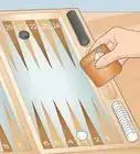 colocar las fichas en un tablero de Backgammon