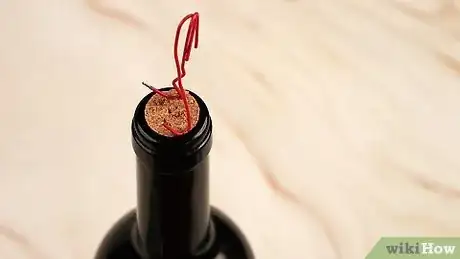 Imagen titulada Open a Wine Bottle Without a Corkscrew Step 26