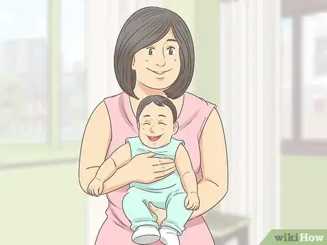 Imagen titulada Lift and Carry a Baby Step 10