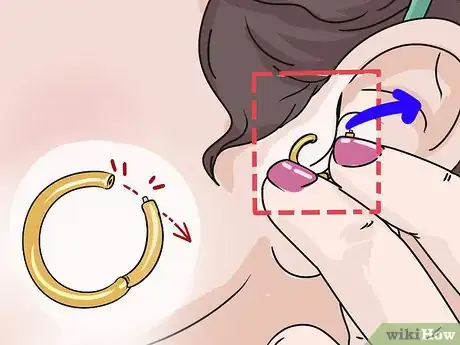 Imagen titulada Take a Tragus Piercing Out Step 6