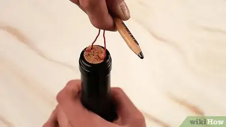 Imagen titulada Open a Wine Bottle Without a Corkscrew Step 27