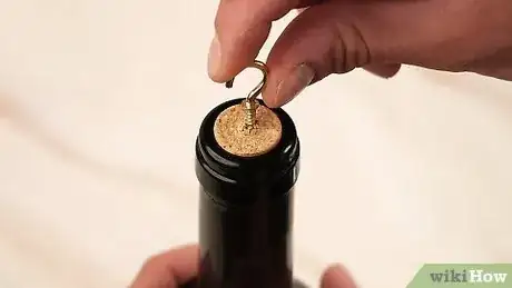 Imagen titulada Open a Wine Bottle Without a Corkscrew Step 17