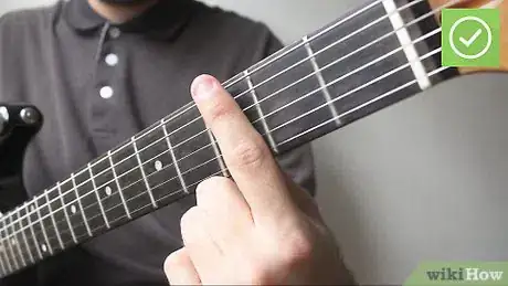 Imagen titulada Play Barre Chords on a Guitar Step 1