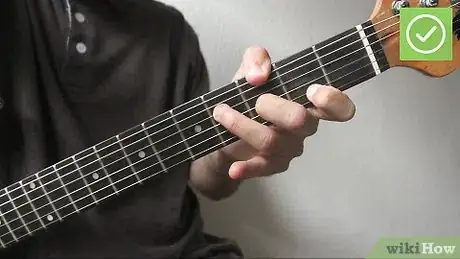 Imagen titulada Play Barre Chords on a Guitar Step 4