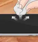sacar las burbujas de un protector de pantalla de vidrio