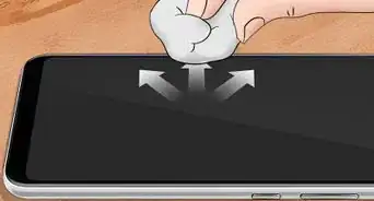 sacar las burbujas de un protector de pantalla de vidrio