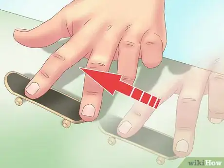 Imagen titulada Kickflip on a Tech Deck Step 2