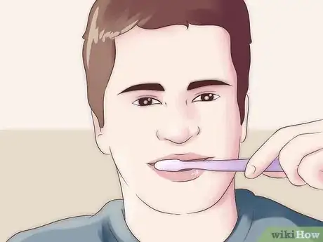 Imagen titulada Remove Yellow Between the Teeth Step 1