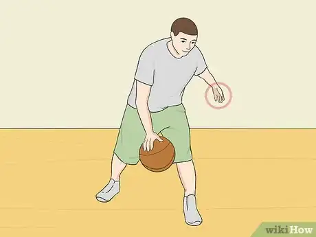 Imagen titulada Dribble a Basketball Between the Legs Step 12.jpeg