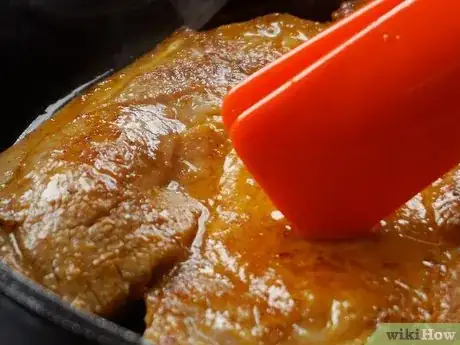 Imagen titulada Tell if Pork Chops Are Done Step 1