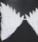 hacer alas de ángel