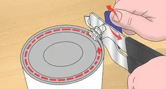 utilizar un abrelatas manual