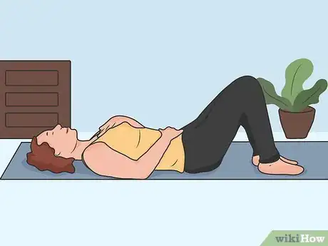 Imagen titulada Stretch Your Lower Back While Lying Down Step 04