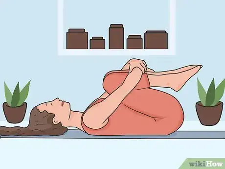 Imagen titulada Stretch Your Lower Back While Lying Down Step 02