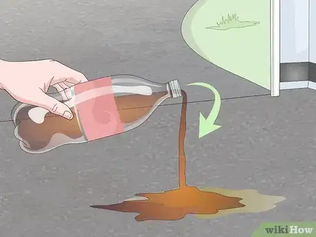 Imagen titulada Clean Hydraulic Fluid from Asphalt Step 7