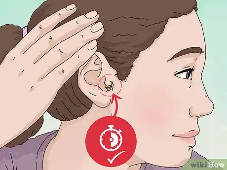 Imagen titulada Take a Tragus Piercing Out Step 9