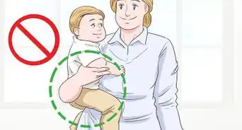 levantar y cargar a un bebé