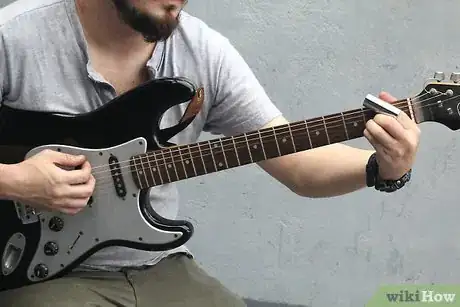 Imagen titulada Use a Guitar Slide Step 7