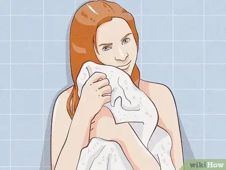 Imagen titulada Make a Body Wrap Towel After a Shower Step 1