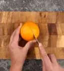 pelar una naranja