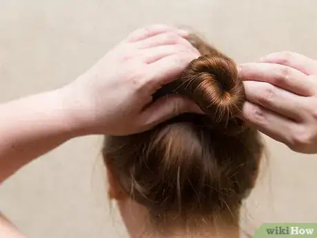 Imagen titulada Put on a Swim Cap Step 6