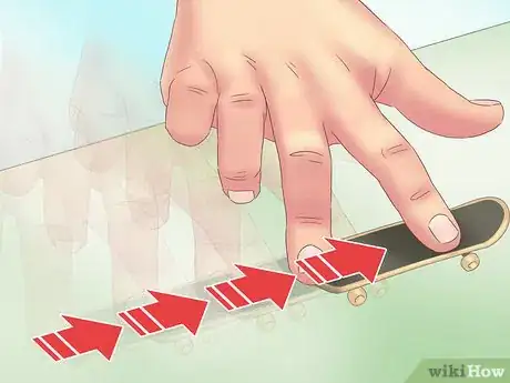 Imagen titulada Kickflip on a Tech Deck Step 10