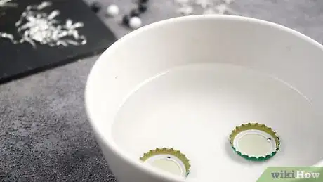 Imagen titulada Make Bottle Cap Earrings Step 25