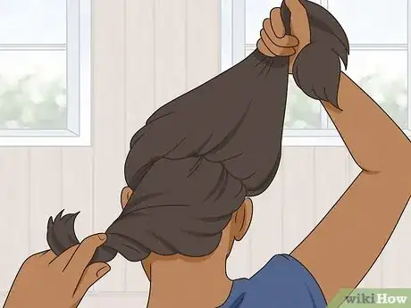 Imagen titulada Curl Hair Using a Hot Air Brush Step 15.jpeg