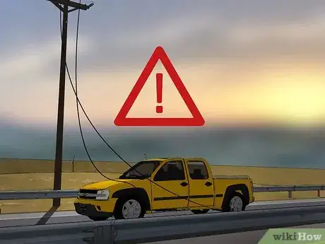 Imagen titulada React if a Power Line Falls on Your Car Step 1