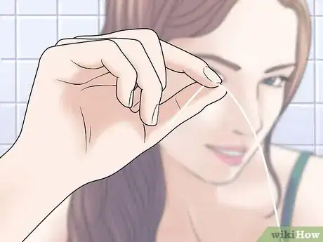 Imagen titulada Floss With Braces Step 5