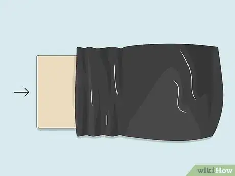 Imagen titulada Go Sledding With a Trash Bag Step 1