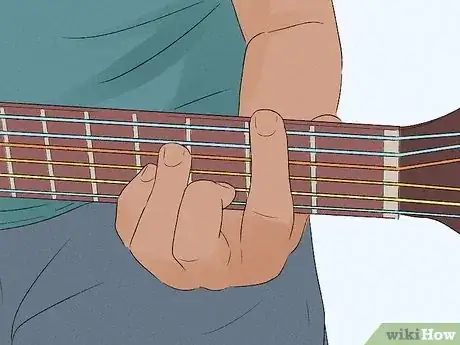 Imagen titulada Play a Bm Chord on Guitar Step 14