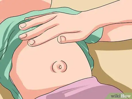 Imagen titulada Push a Hernia Back in Step 11